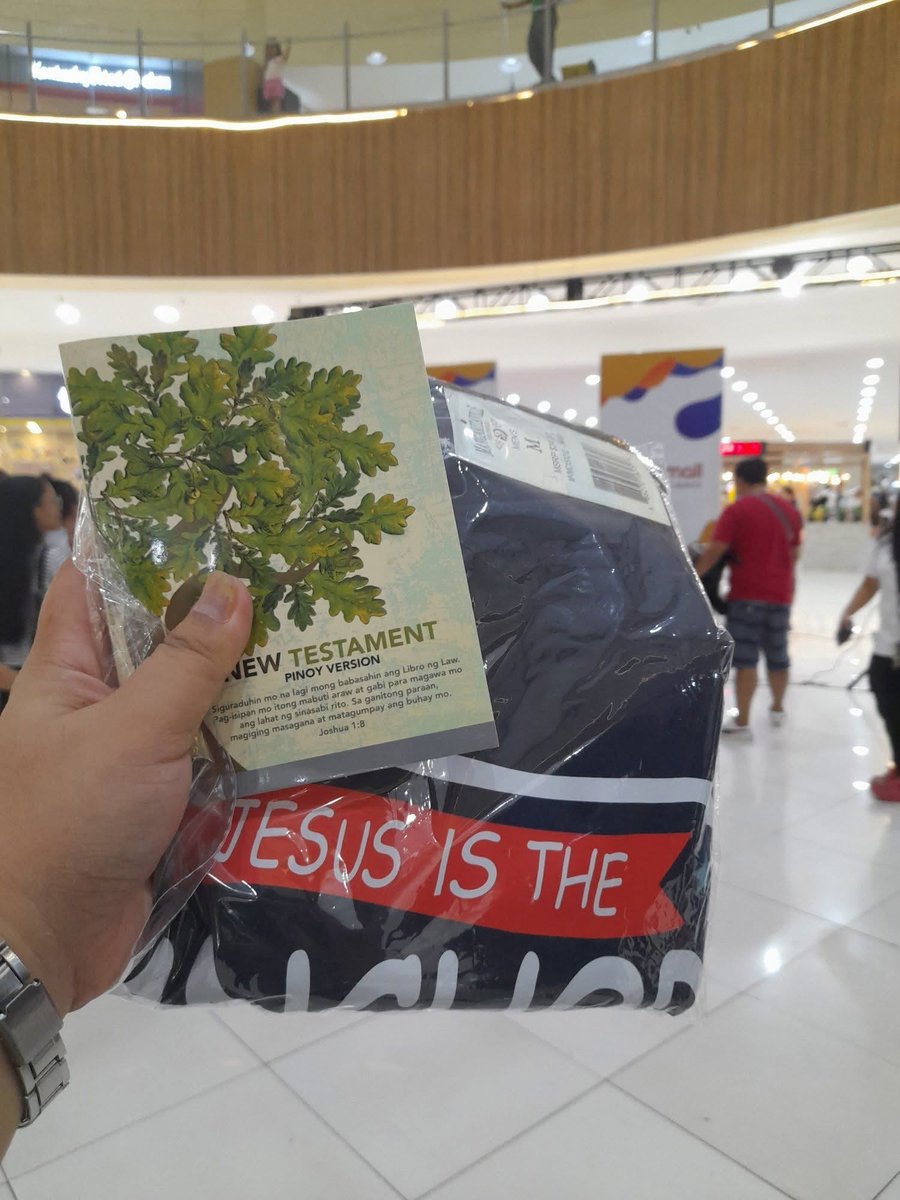 Kate Torres leading worship during a mall busking session